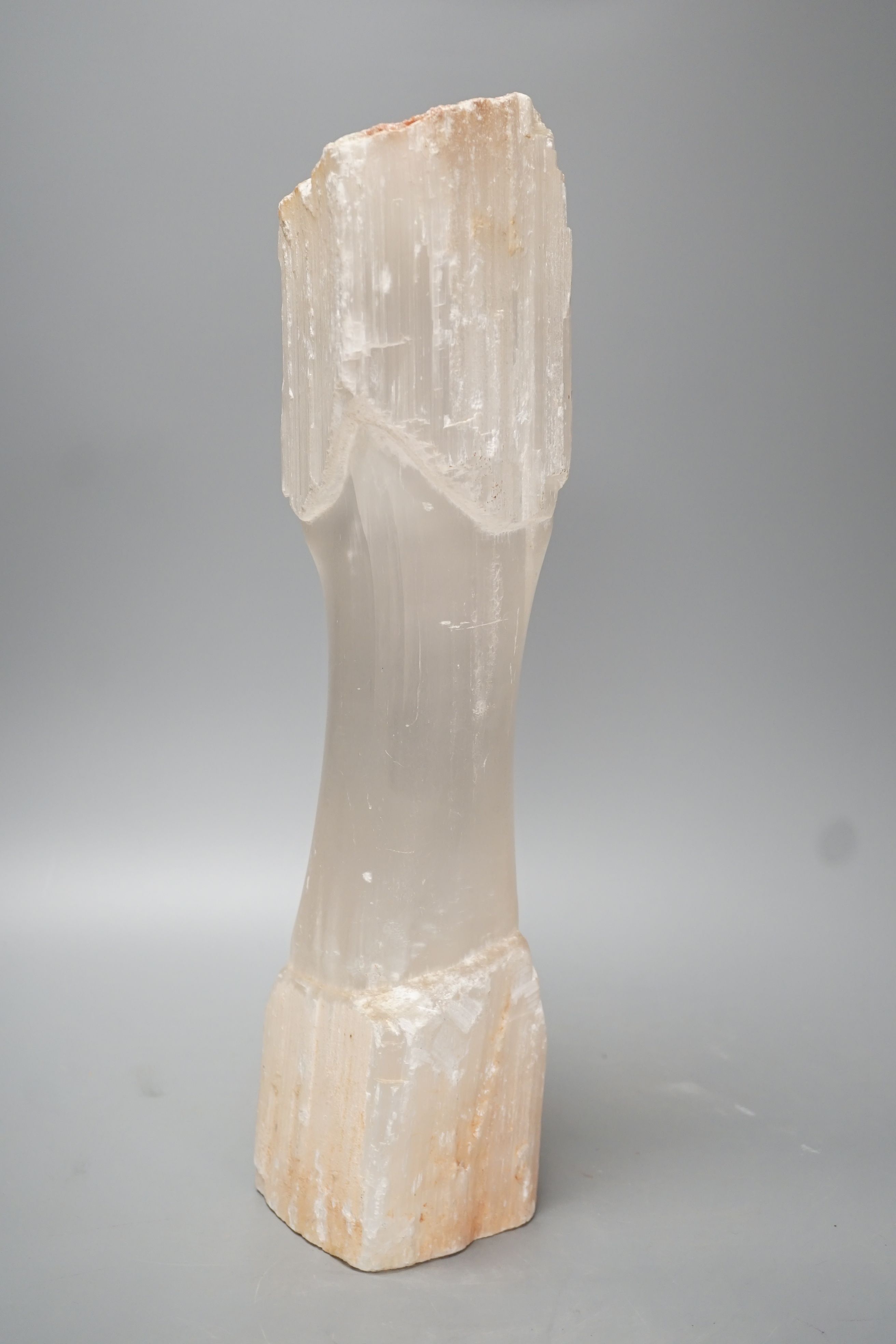 A carved mineral ornament - 33cm long